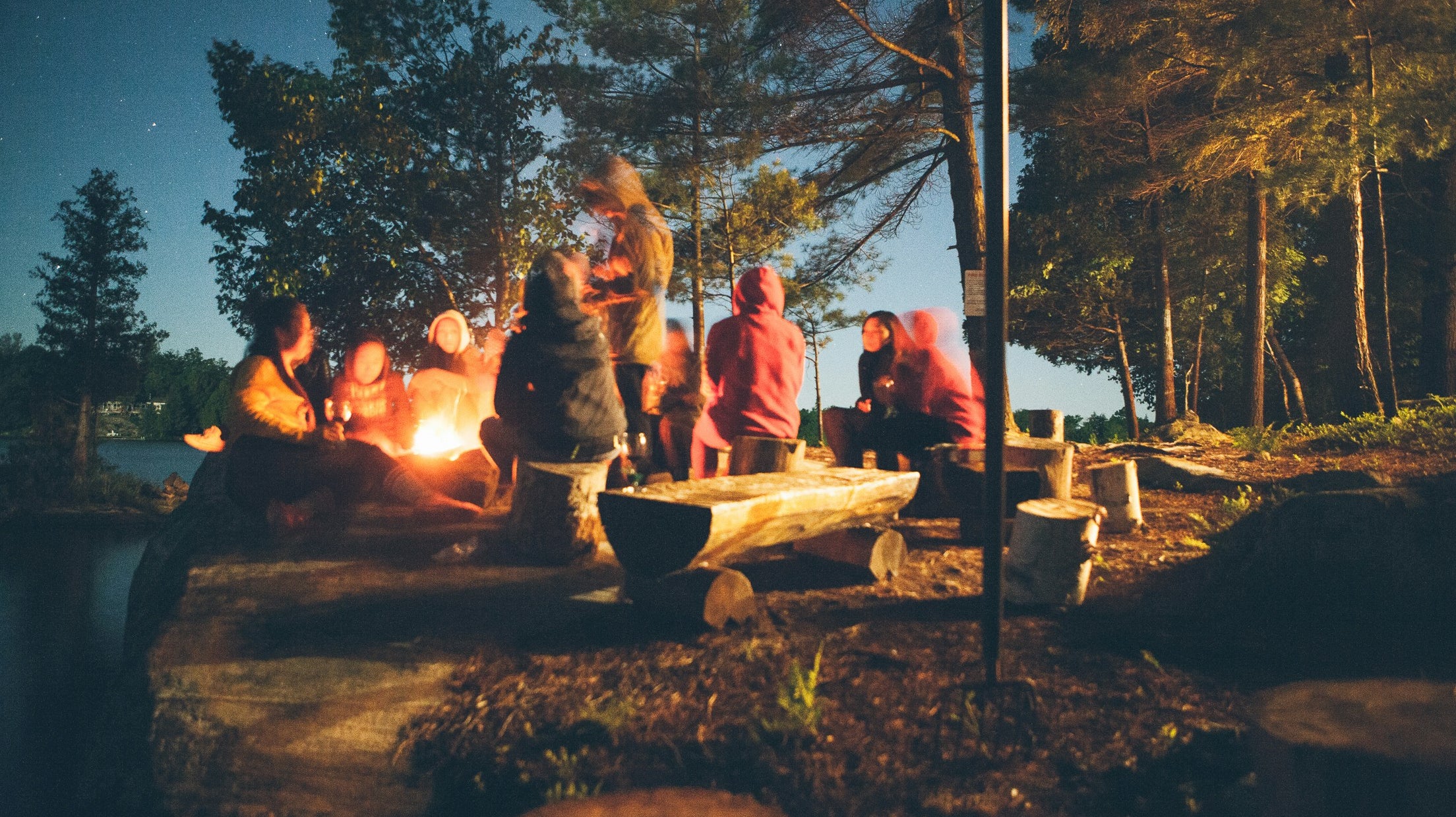 group of people near bonfire