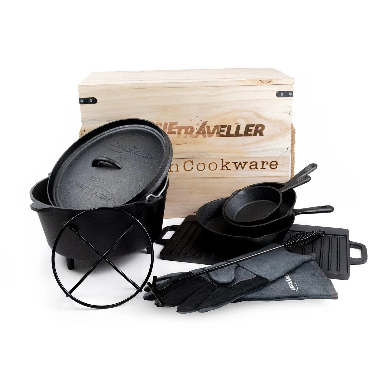 A black cast iron cookware set neatly arranged in a wooden box, highlighting its durable construction and classic style.